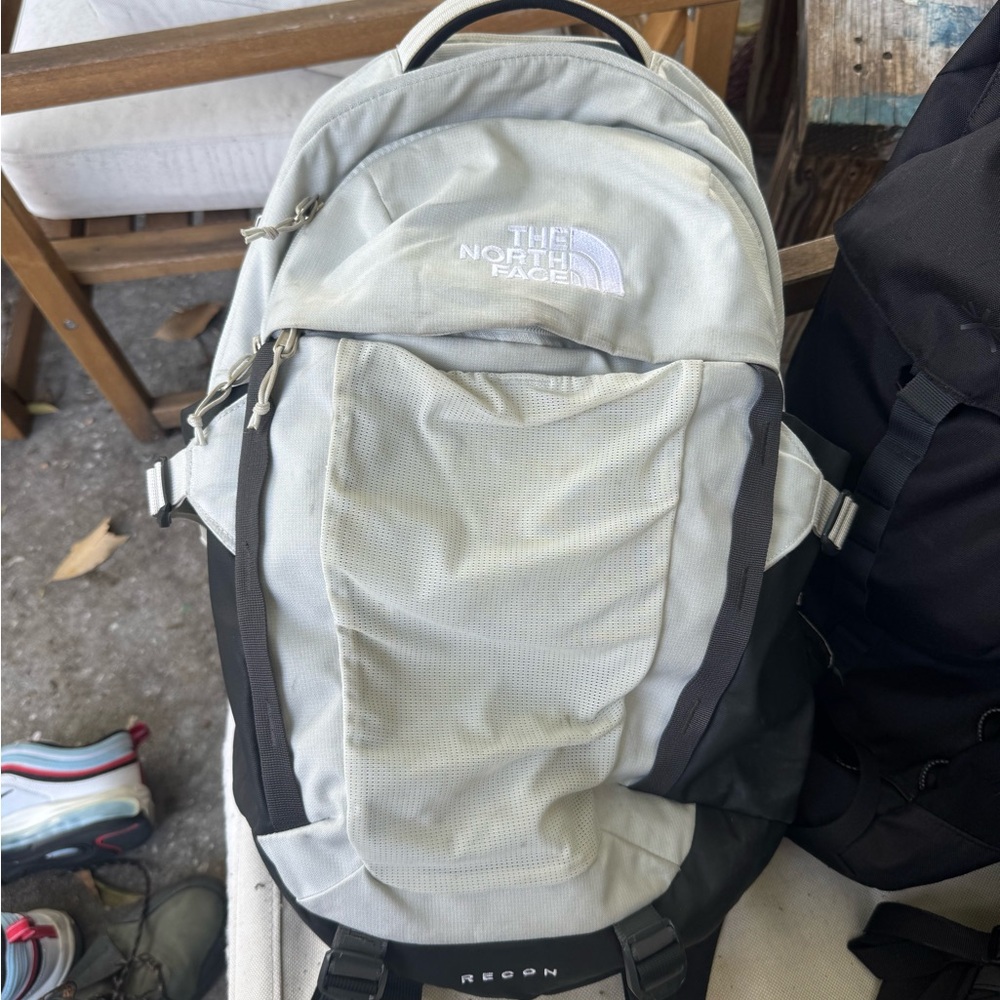 The North Face Men's white and Black Backpack